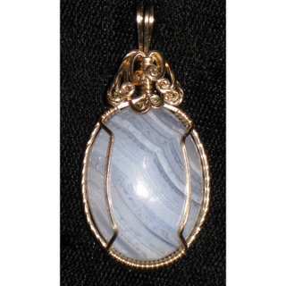 P-22 Lace agate cabochon wrapped in 14 carat gold filled wire $35.jpg